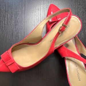 Antonio Milani open back pump style heels with bow accent